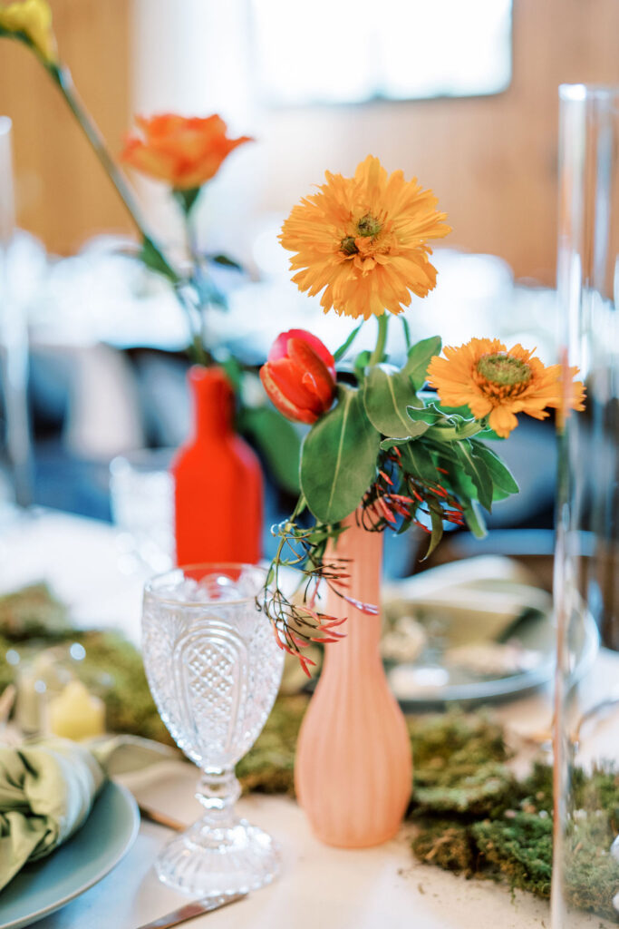 Spring florals at barn wedding reception